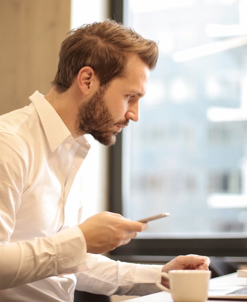 Modern office workplace with laptop and documents